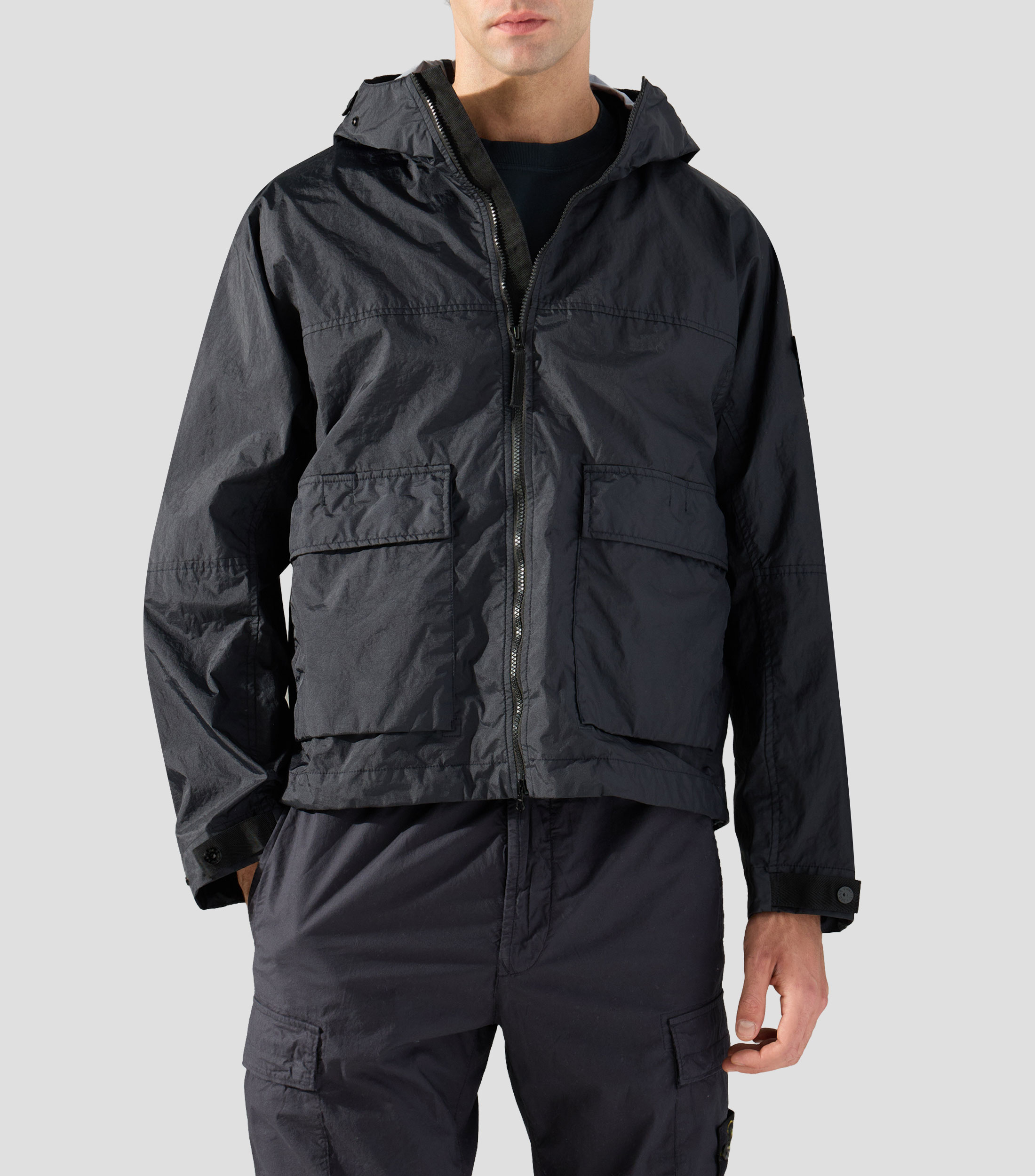 Chamarra impermeable con capucha Hombre